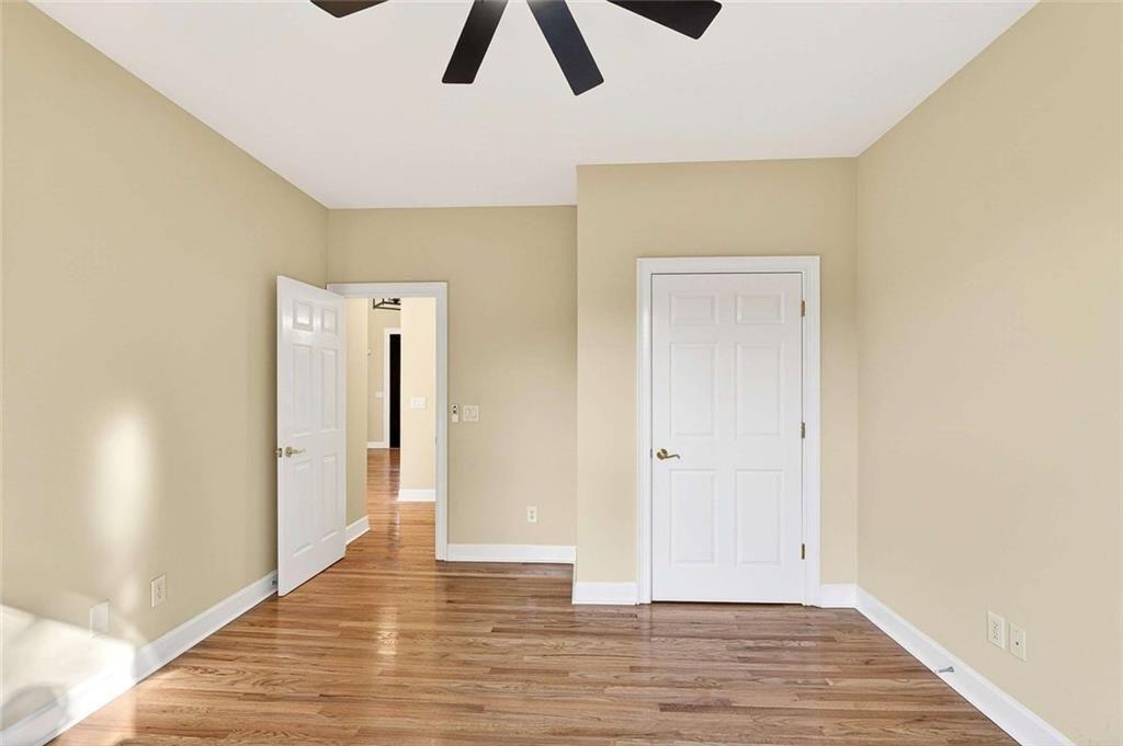 3316 Keenland Road Marietta, GA 30062 - Photo 26 of 57 a view of an empty room and wooden floor