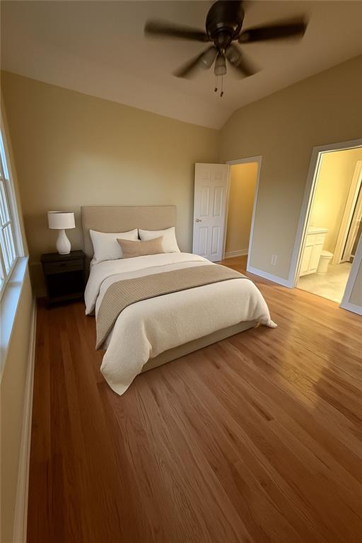 3316 Keenland Road Marietta, GA 30062 - Photo 26 of 54 a bedroom with a bed and wooden floor