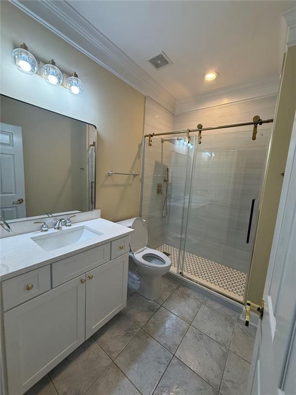 3316 Keenland Road Marietta, GA 30062 - Photo 27 of 54 a bathroom with a shower sink and mirror