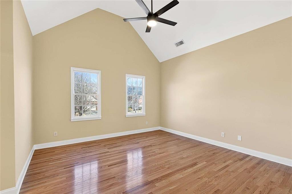 3316 Keenland Road Marietta, GA 30062 - Photo 28 of 57 wooden floor in an empty room with a window