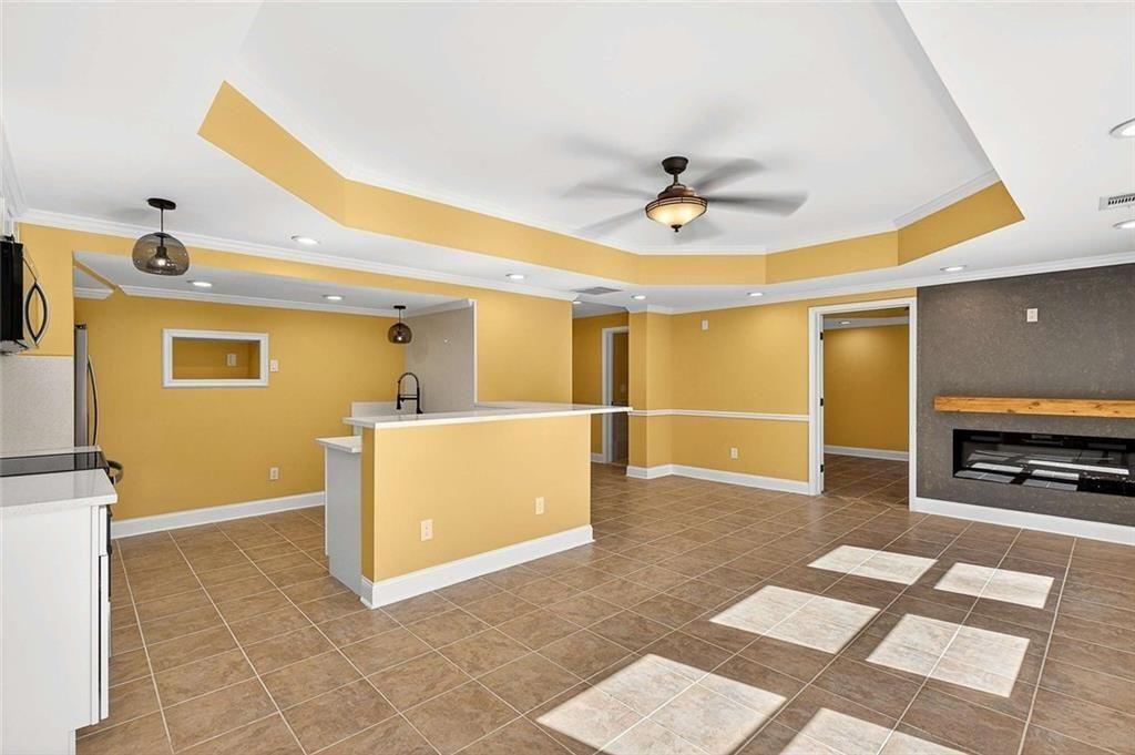 3316 Keenland Road Marietta, GA 30062 - Photo 38 of 57 a view of a livingroom with a furniture and a ceiling fan