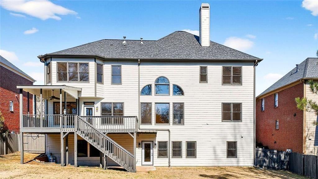 3316 Keenland Road Marietta, GA 30062 - Photo 49 of 57 a front view of a house with large windows
