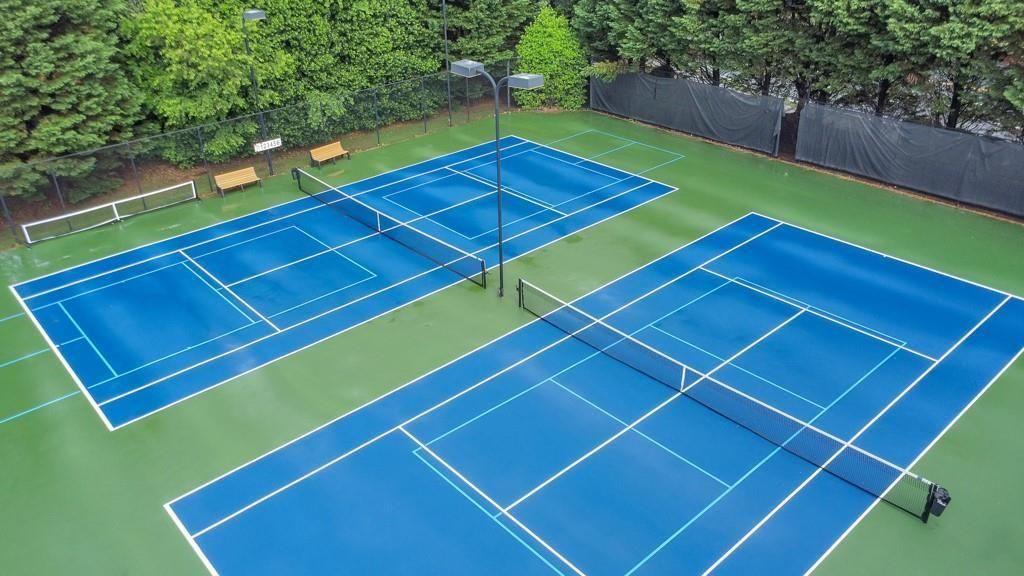 3316 Keenland Road Marietta, GA 30062 - Photo 52 of 54 a view of an outdoor space and tennis court