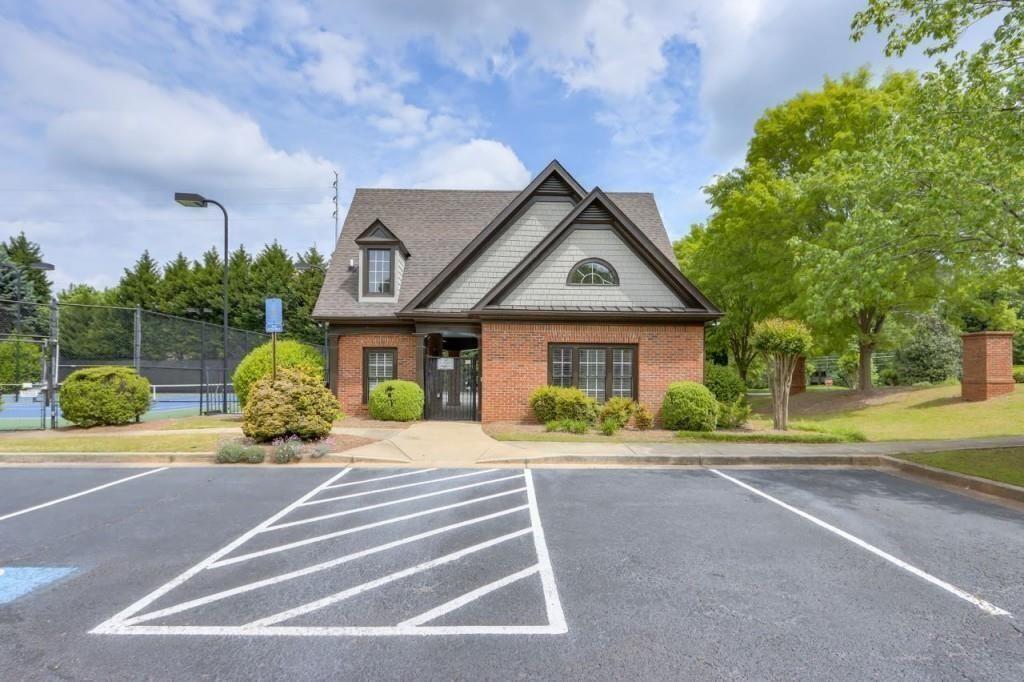 3316 Keenland Road Marietta, GA 30062 - Photo 52 of 57 a front view of a house with a yard