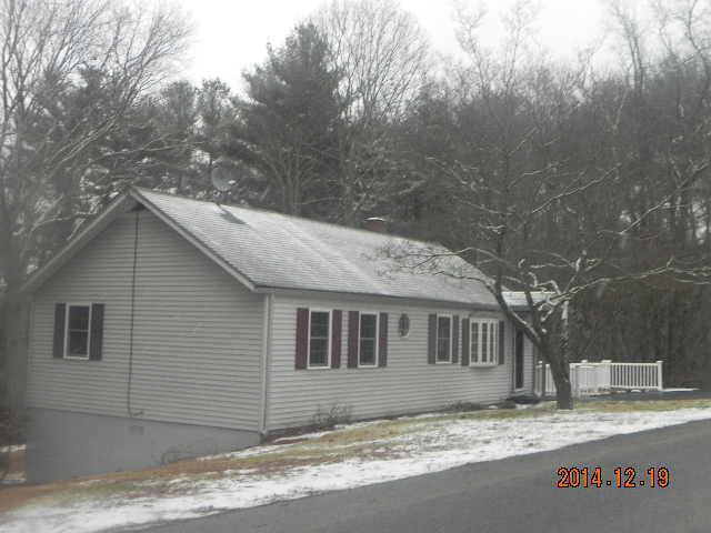 11 Edgarton Road Columbia, CT 06237 - Photo 1 of 1 a front view of a house with a yard