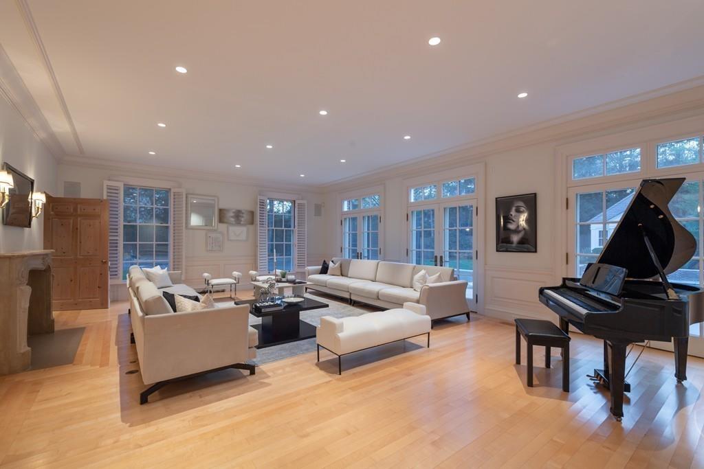 11 Cramond Road Brookline, MA 02467 - Photo 22 of 41 a living room with furniture and a piano