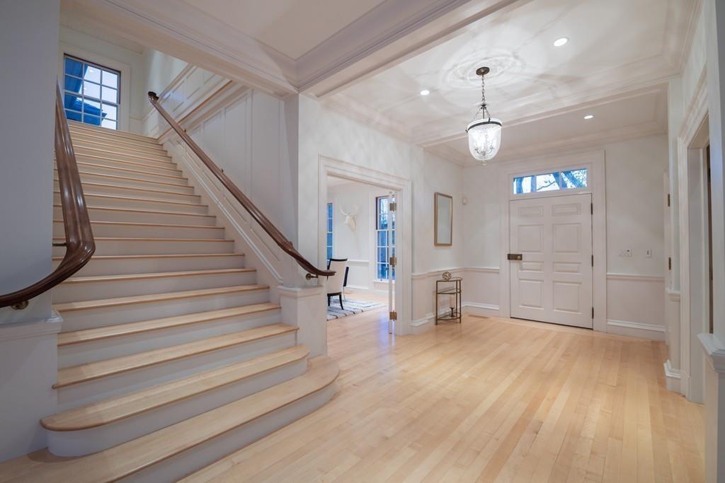 11 Cramond Road Brookline, MA 02467 - Photo 23 of 41 a view of an entryway with wooden floor and a front door
