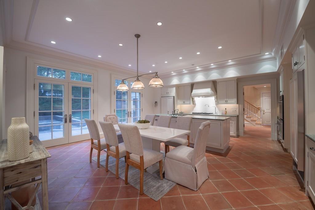 11 Cramond Road Brookline, MA 02467 - Photo 24 of 41 a large kitchen with a table and chairs