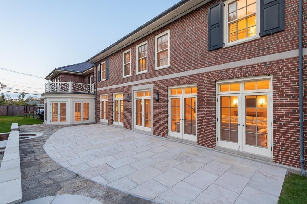 11 Cramond Road Brookline, MA 02467 - Photo 25 of 41 a view of a brick house with many windows