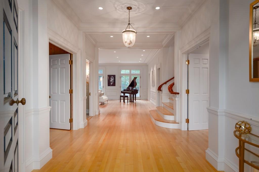 11 Cramond Road Brookline, MA 02467 - Photo 3 of 41 a view of a room with wooden floor lounge chair and windows