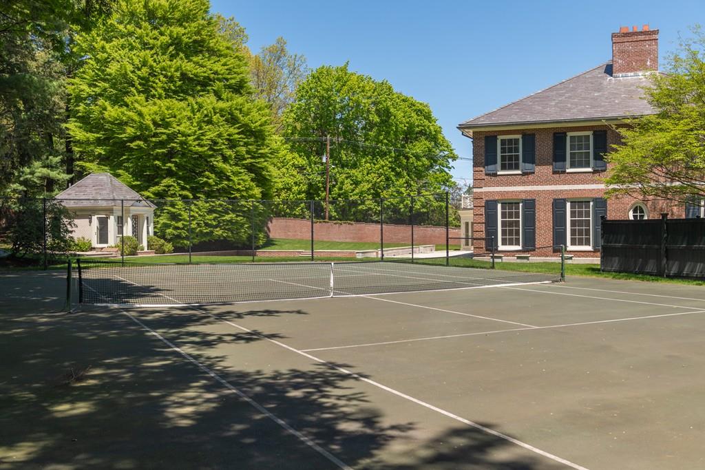 11 Cramond Road Brookline, MA 02467 - Photo 40 of 41 a front view of a house with a garden