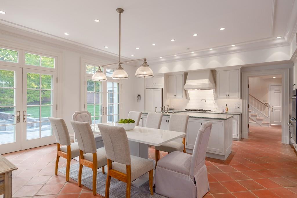 11 Cramond Road Brookline, MA 02467 - Photo 4 of 41 a large kitchen with a table and chairs