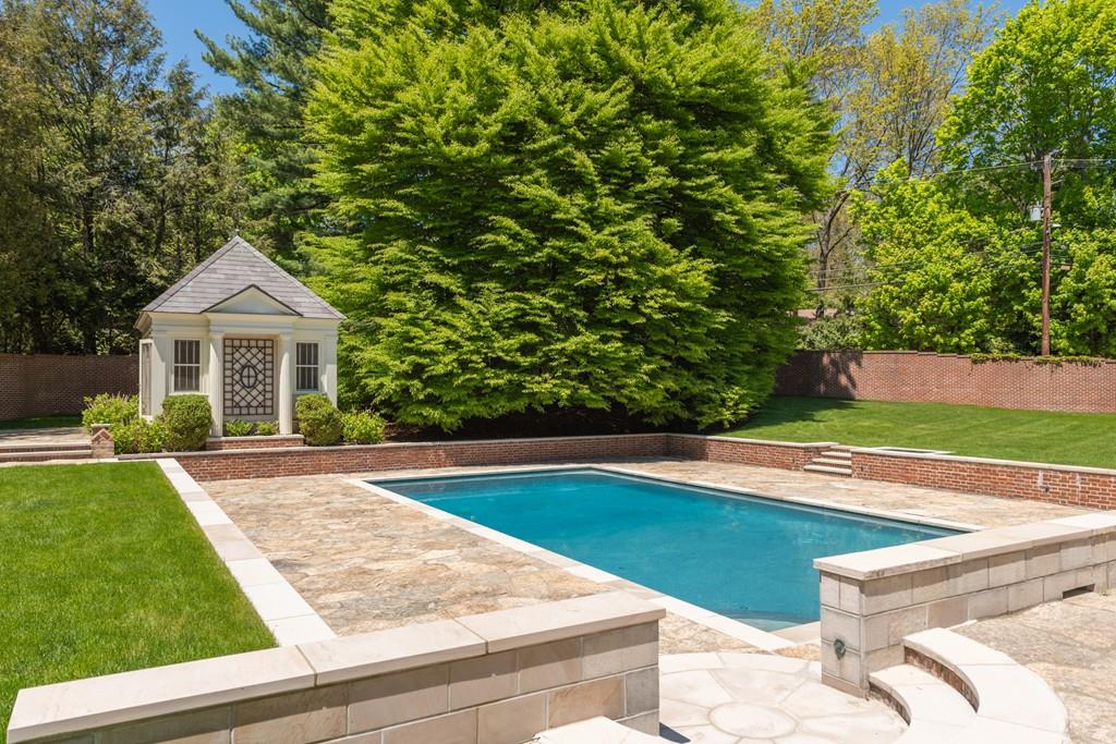 11 Cramond Road Brookline, MA 02467 - Photo 41 of 41 a white house with a big yard and large trees