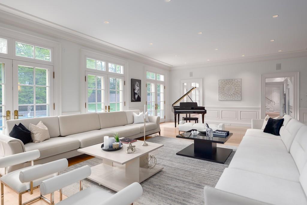 11 Cramond Road Brookline, MA 02467 - Photo 5 of 41 a living room with furniture fireplace and a large window