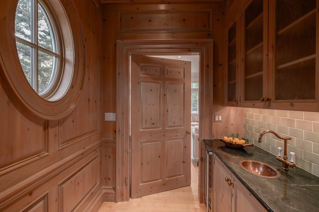 11 Cramond Road Brookline, MA 02467 - Photo 9 of 41 a bathroom with a sink a toilet and a mirror