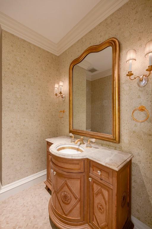 11 Cramond Road Brookline, MA 02467 - Photo 10 of 41 a bathroom with a sink and a mirror