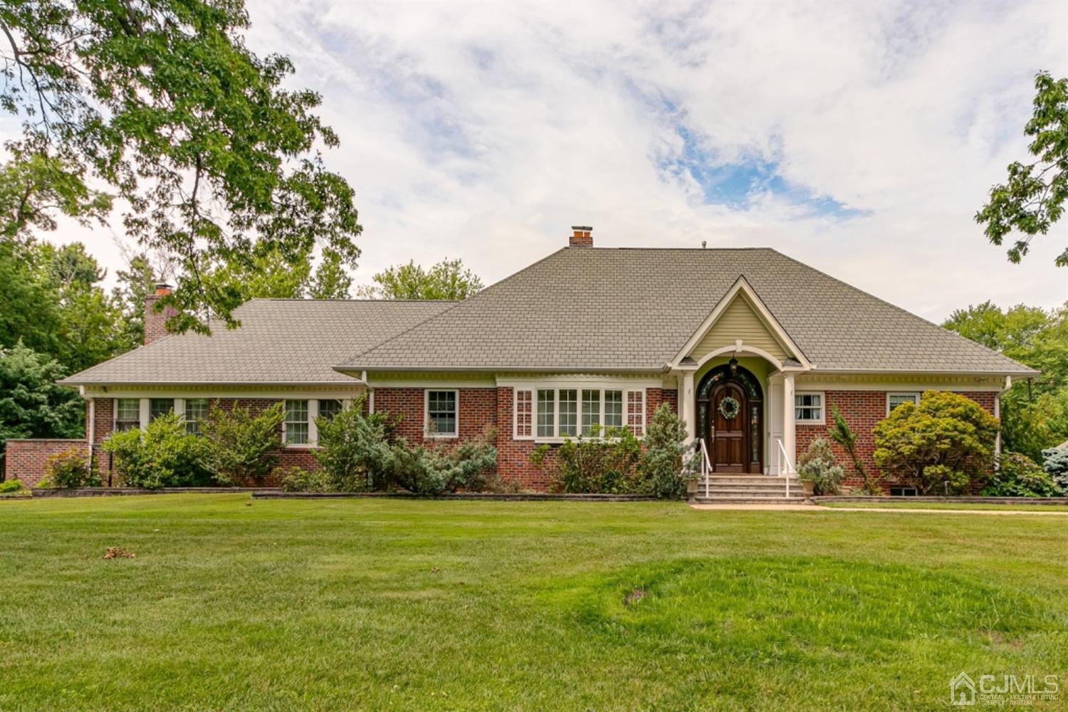4 Longview Road Edison, NJ 08820 - Photo 2 of 47 a front view of a house with garden