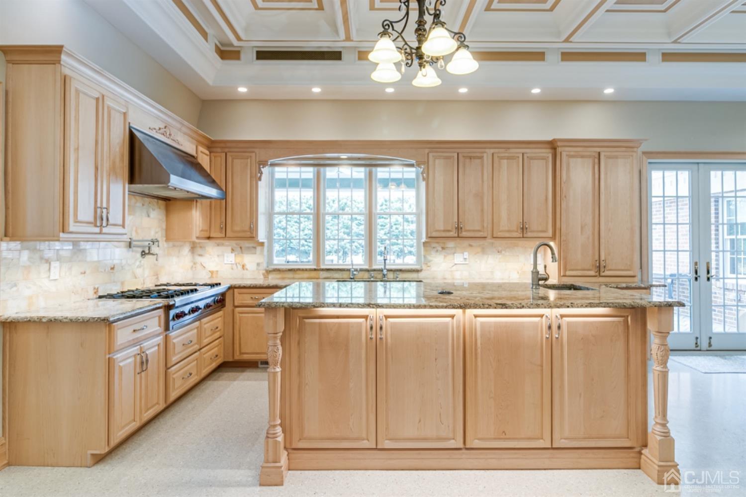 4 Longview Road Edison, NJ 08820 - Photo 13 of 47 a large kitchen with granite countertop a sink window and cabinets