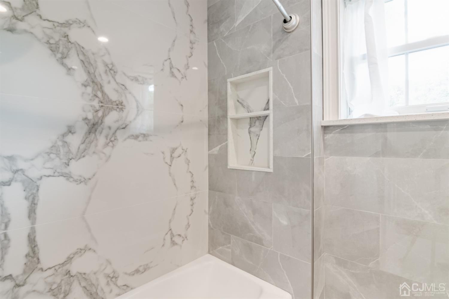 4 Longview Road Edison, NJ 08820 - Photo 24 of 47 a bathroom with a shower
