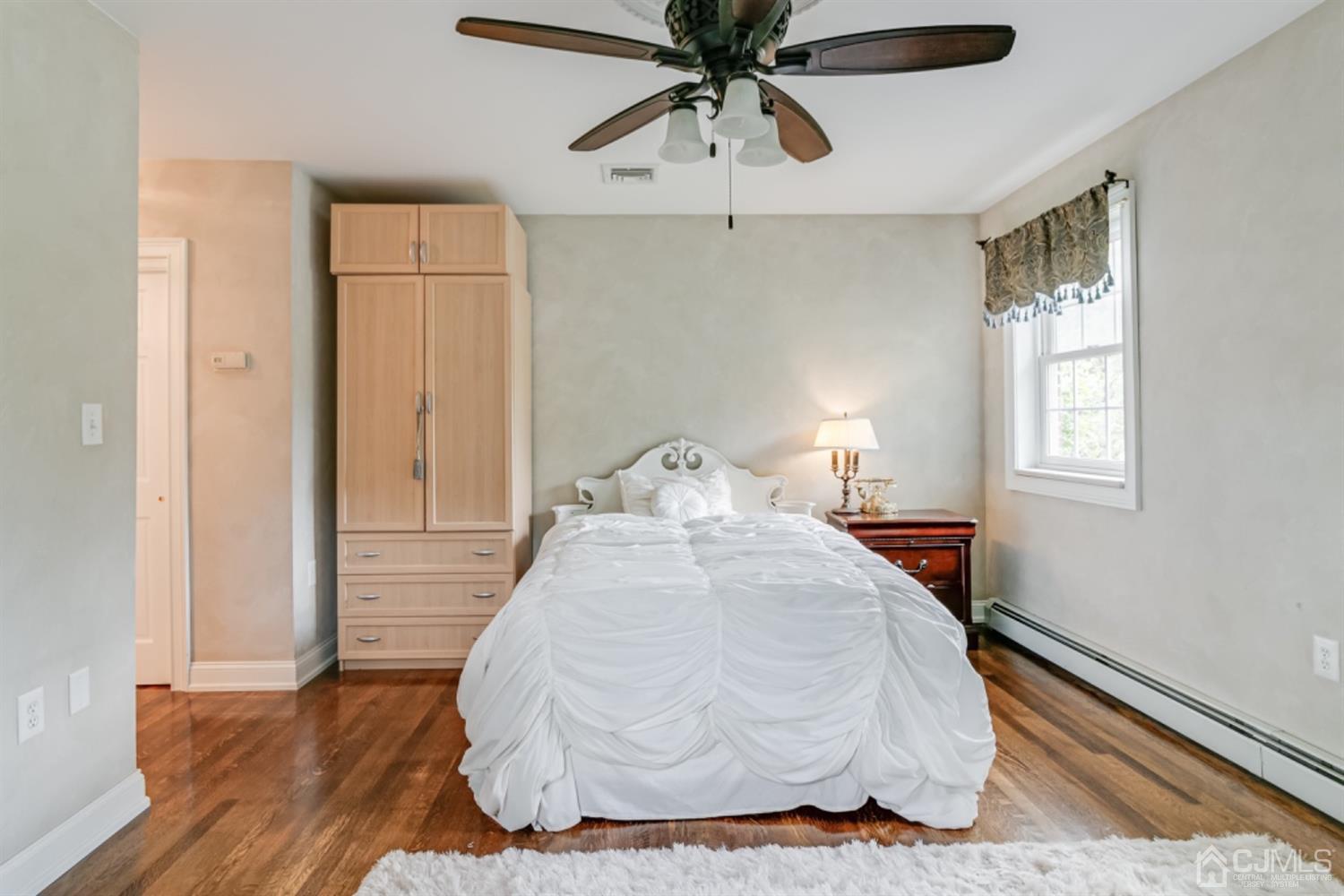 4 Longview Road Edison, NJ 08820 - Photo 25 of 47 a bedroom with a bed and window