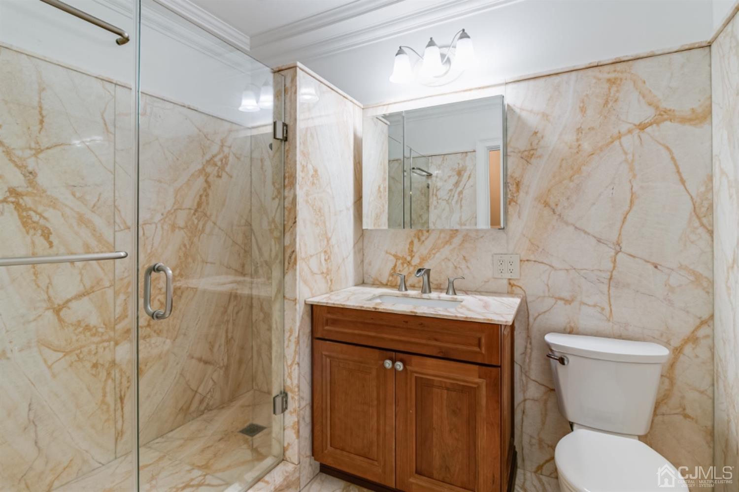 4 Longview Road Edison, NJ 08820 - Photo 27 of 47 a bathroom with a toilet sink shower and mirror