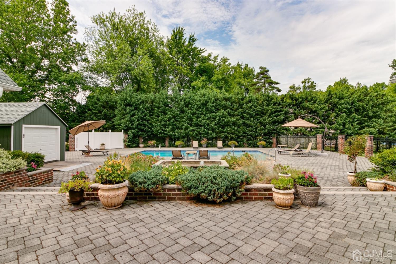 4 Longview Road Edison, NJ 08820 - Photo 33 of 47 a front view of a house with patio