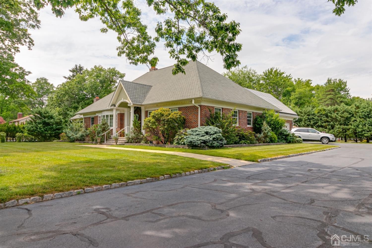 4 Longview Road Edison, NJ 08820 - Photo 35 of 47 a view of a house with a yard
