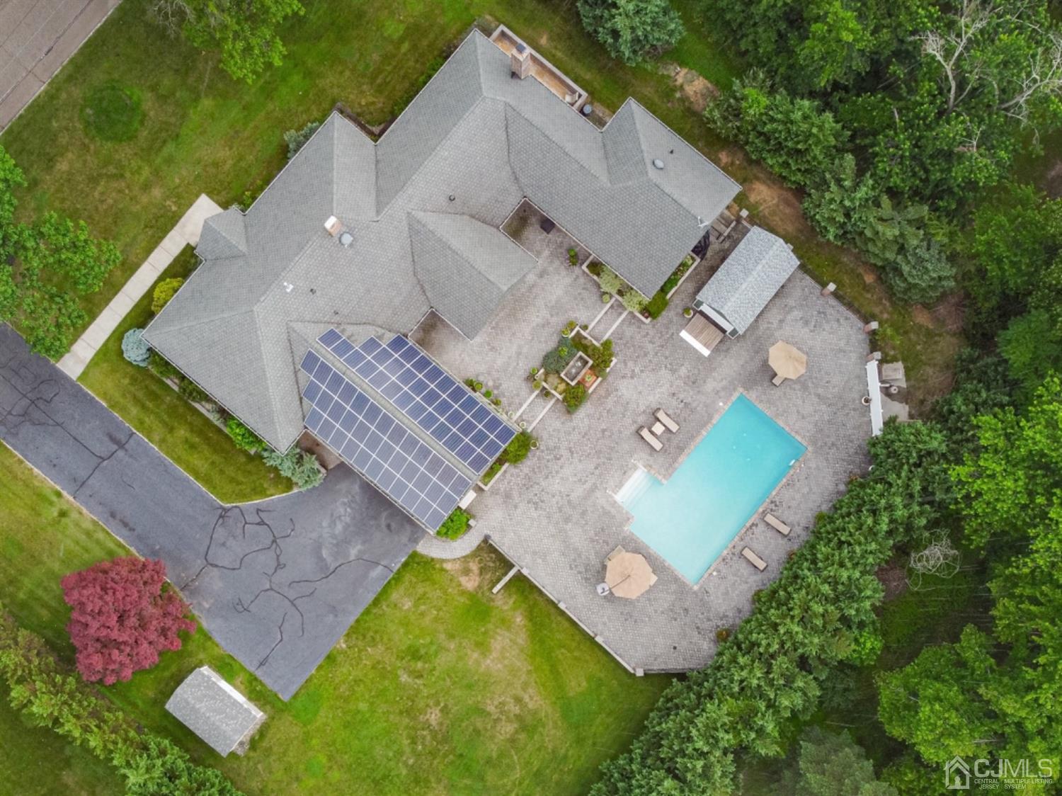 4 Longview Road Edison, NJ 08820 - Photo 45 of 47 an aerial view of a house with a swimming pool patio and outdoor seating