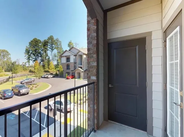 a view of a balcony with an outdoor space