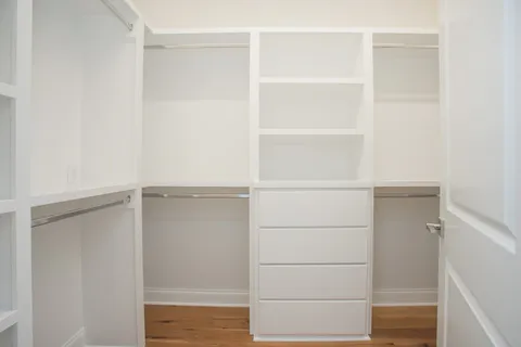 a view of an empty walk in closet