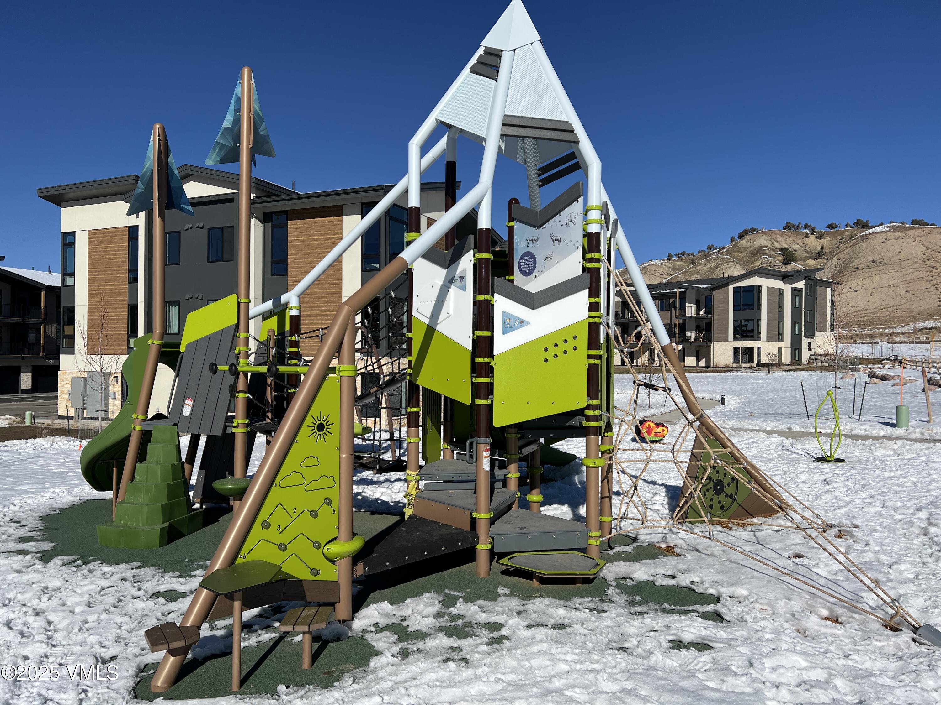 91 Mount Hope Circle, Unit G301 Eagle, CO 81631 - Photo 12 of 13 a view of a park with a slide