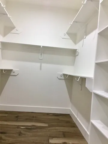 a view of a room with racks on the wall