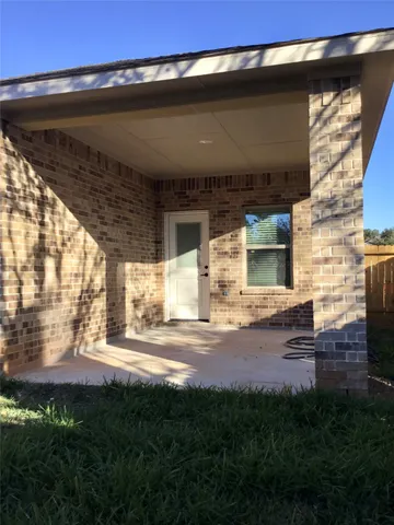 a view of house with yard