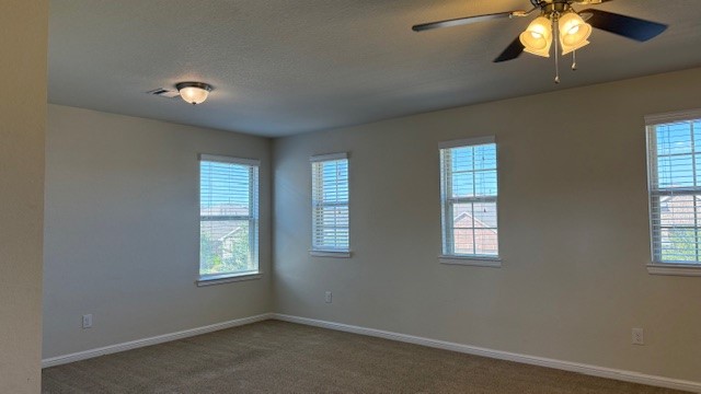 3822 Supremes Trail Spring, TX 77386 - Photo 25 of 40 a view of an empty room with a window and chandelier fan