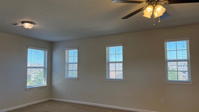 3822 Supremes Trail Spring, TX 77386 - Photo 29 of 40 an empty room with windows and fan