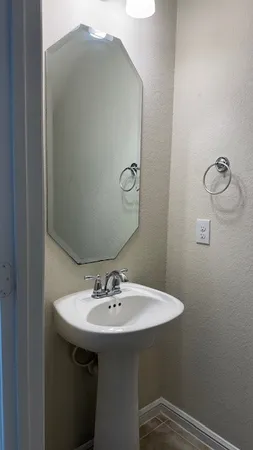 a view of street with a car parked