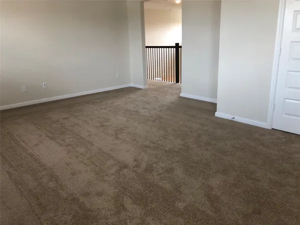 a kitchen with stainless steel appliances granite countertop a refrigerator a sink a stove a microwave and wooden cabinets