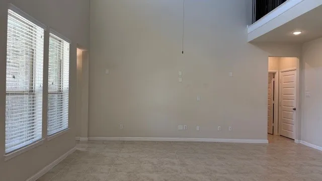 an empty room with windows