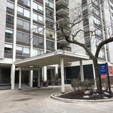 a view of a building with a porch