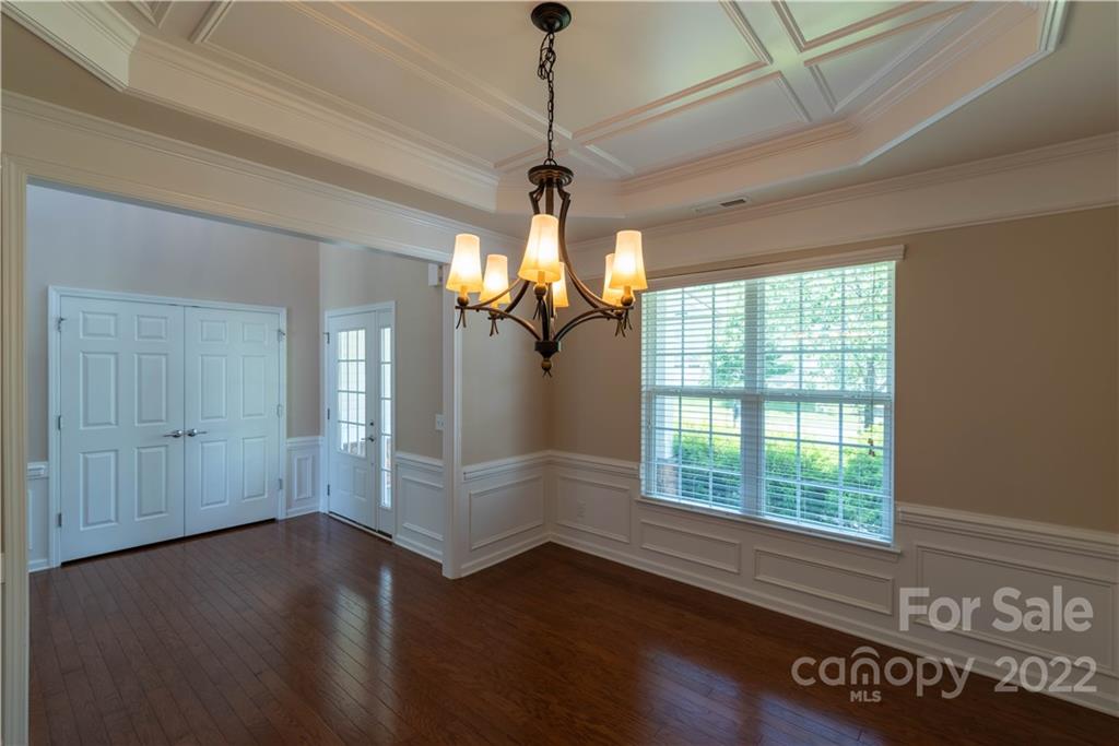8115 Red Water Road Charlotte, NC 28277 - Photo 11 of 25 a view of wooden floor and windows in a room