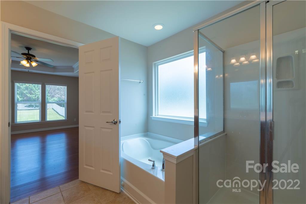 8115 Red Water Road Charlotte, NC 28277 - Photo 22 of 25 a view of a hallway to an entryway with front door