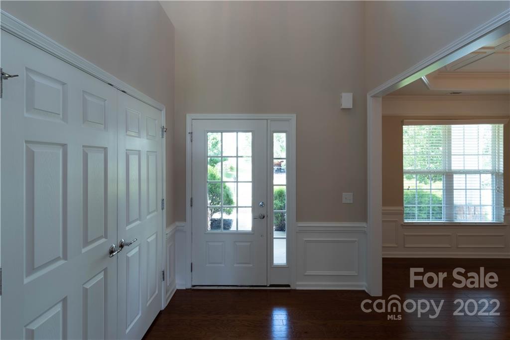 8115 Red Water Road Charlotte, NC 28277 - Photo 6 of 25 a view of an entryway with wooden floor