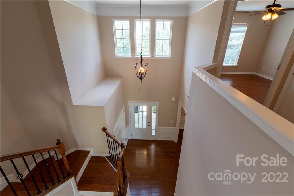 8115 Red Water Road Charlotte, NC 28277 - Photo 9 of 25 a view of entryway and hall with wooden floor
