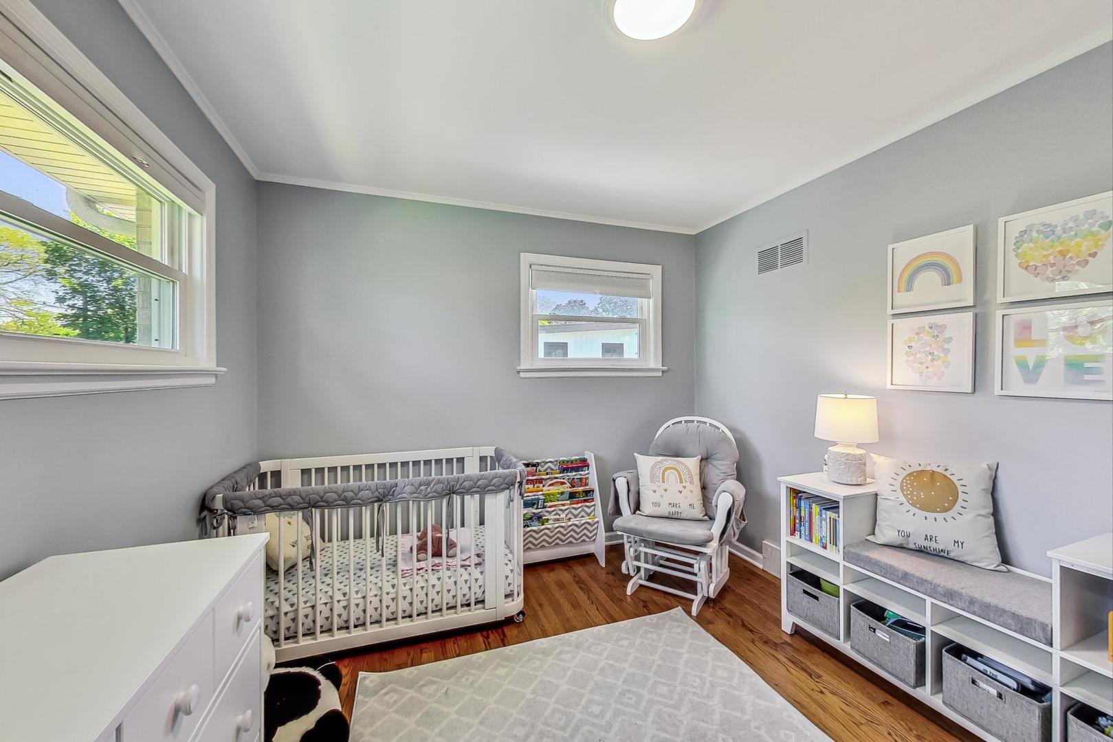1340 Pendleton Lane Glenview, IL 60025 - Photo 24 of 39 a bedroom with furniture and a window