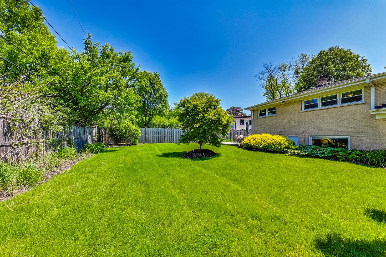 1340 Pendleton Lane Glenview, IL 60025 - Photo 36 of 39 a view of a house with backyard and garden