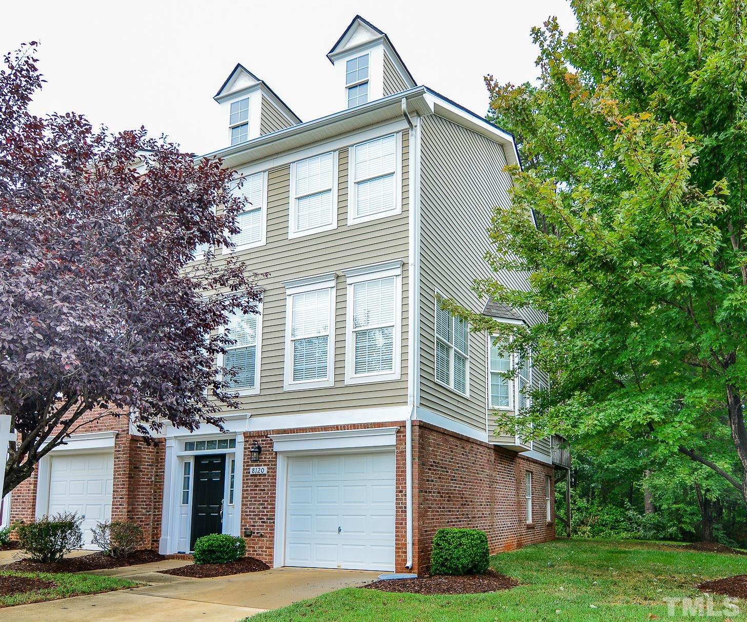 8120 Upper Lake Drive Raleigh, NC 27615 - Photo 1 of 29 front view of a house with a yard