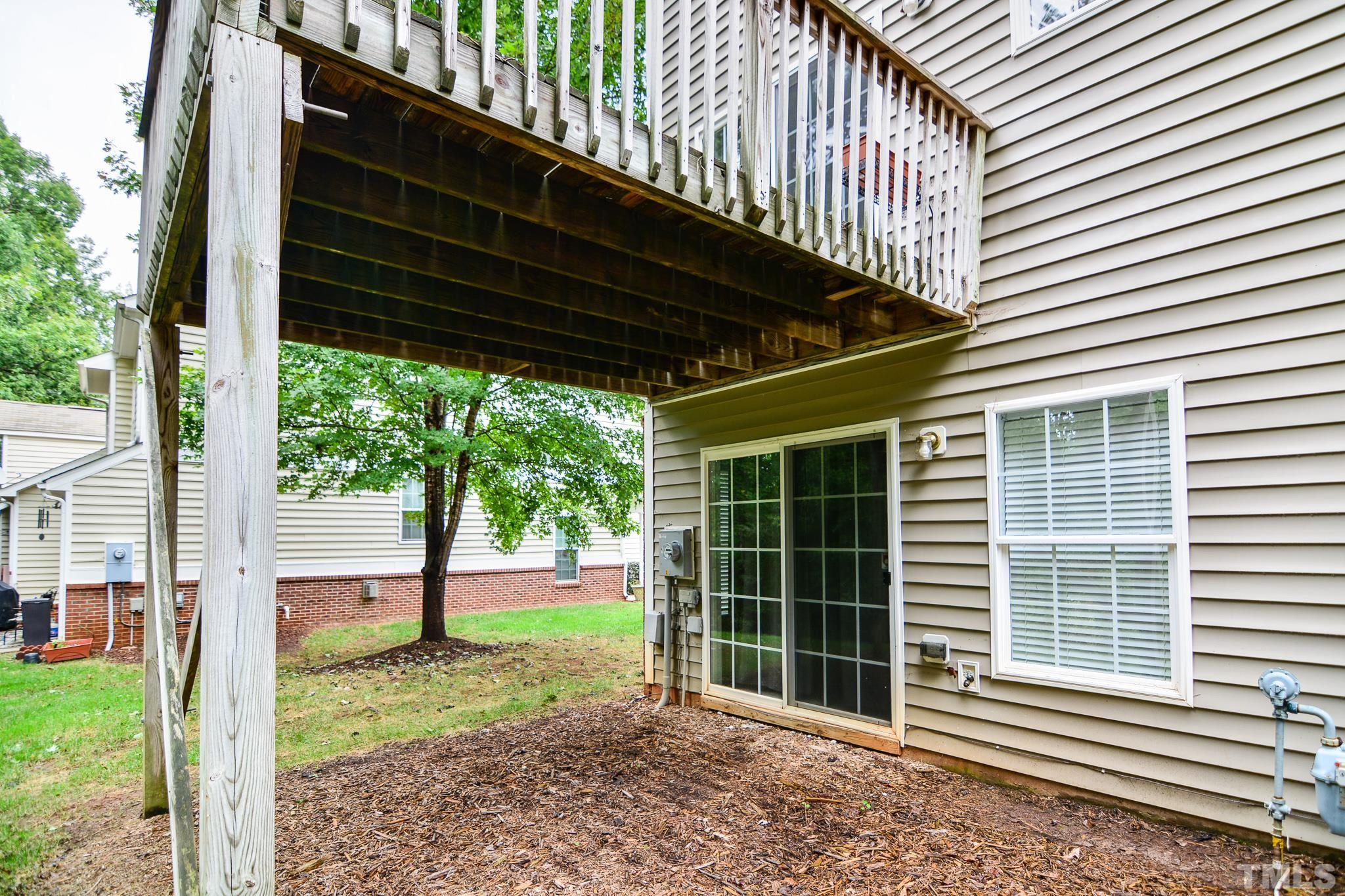 8120 Upper Lake Drive Raleigh, NC 27615 - Photo 27 of 29 a view of a house with a large window