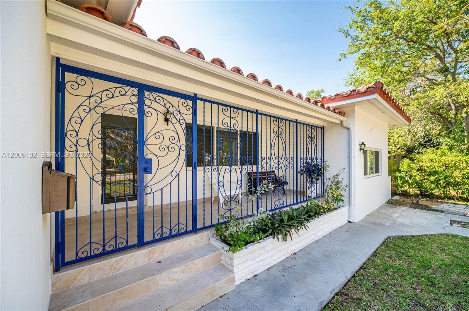 330 Southwest 27th Road Miami, FL 33129 - Photo 42 of 62 a front view of a house with garden