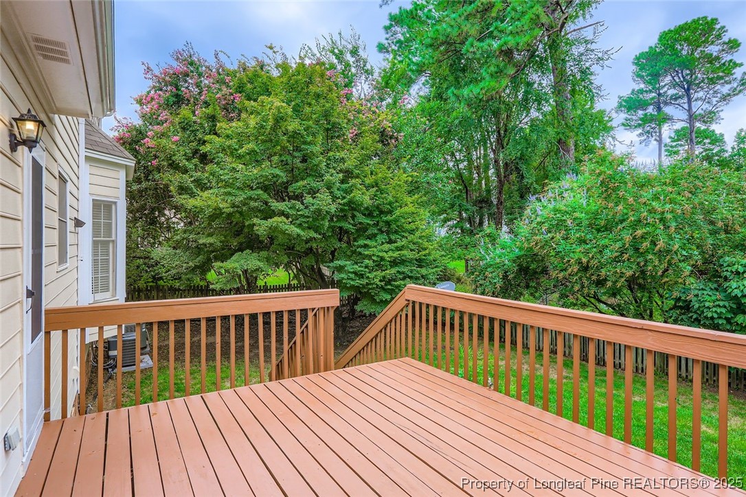 9012 Walking Stick Trail Raleigh, NC 27615 - Photo 26 of 28 a view of balcony with wooden floor