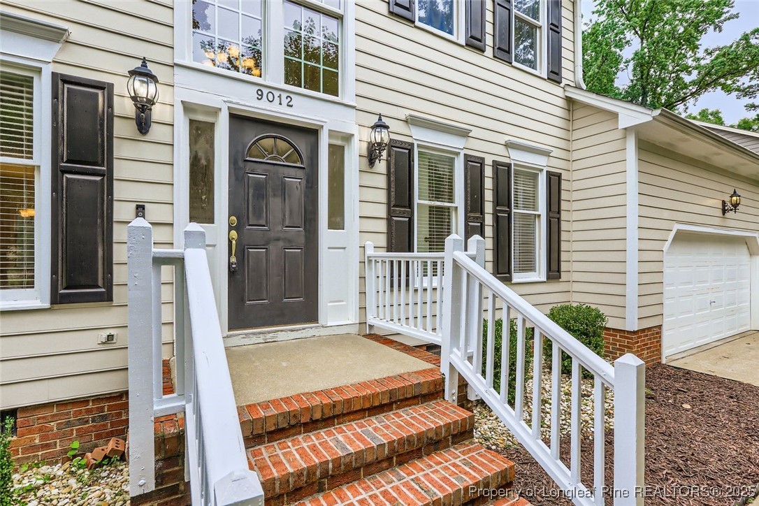 9012 Walking Stick Trail Raleigh, NC 27615 - Photo 3 of 28 a view of a balcony with door